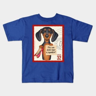 Cute Doxie Dachshund holding a new chew toy Kids T-Shirt